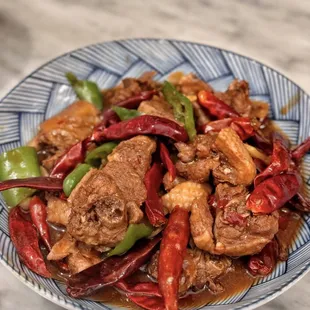 a blue and white plate of food