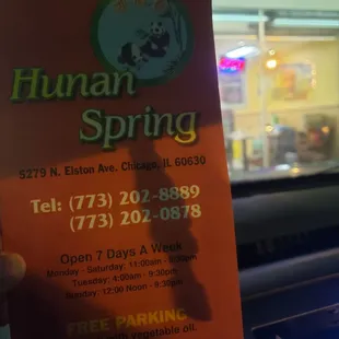 a person holding up a sign