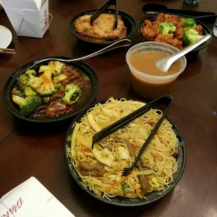 Beef and broccoli, shrimp egg foo young with gravy on the side, orange chicken, and Singapore rice noodles