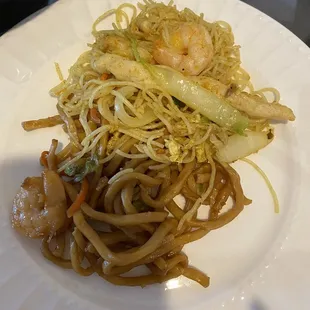 a plate of noodles and shrimp