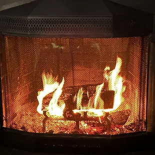 a fire burning in a fireplace