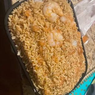 Large shrimp fried rice with duck sauce.