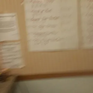 a blurry photo of a desk with papers on it