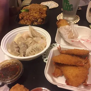 Our feast! Egg rolls, fried jumbo shrimp, sesame chicken, triple steamed dumplings for only $25!