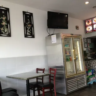 a table and chairs in a restaurant