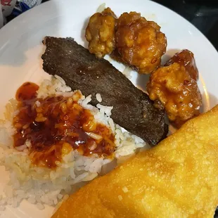 Rice w super spicy general sauce, generals chicken, beef stick and crab rangoon.