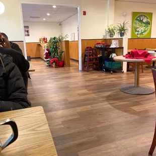 a restaurant with tables and chairs