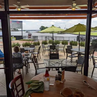 View of the patio seating and lake.