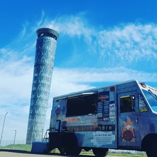 a tall tower in the background