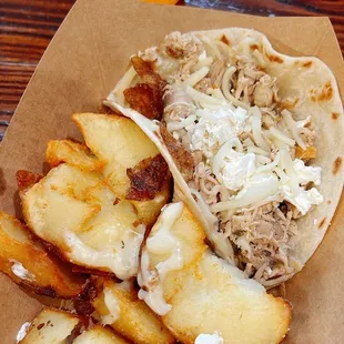 Kids taco with potatoes and a Jarritos