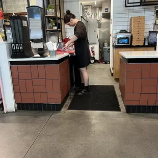She's cutting raw meat while scrolling on her phone. I told the manager and they asked me to leave. What more do you need to know