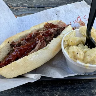 Brisket sandwich with Mac n Cheese side.