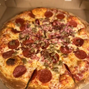 a pepperoni pizza in a box