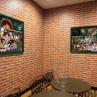 a table and chairs in a restaurant