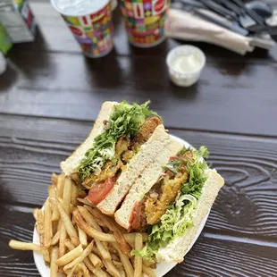 Fried green tomato sandwich with fries $11.79