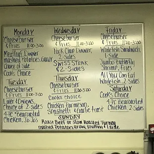 a menu on a white board