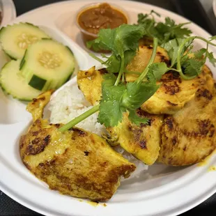 Chicken satay over rice