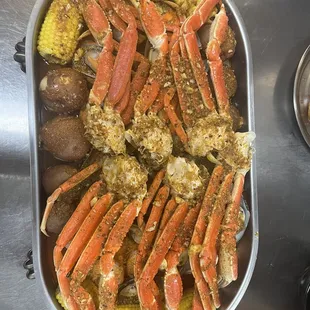 crab legs and corn on the cob