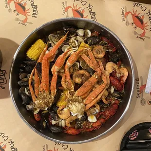 1 lb. Crawfish 1 lb. Clams 1 lb. Snow Crab Legs 1 lb. Shrimp No Head, corn and Potatoes