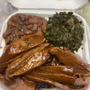 Two Meat Plate (w/ 2 sides): Brisket, Sausage, Mustard Greens, Red Beans and Rice.