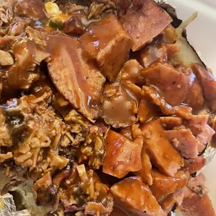 a plate of meat and rice