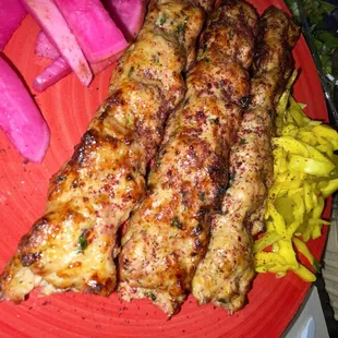 a plate of meat and vegetables