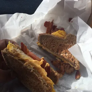 The breakfast sandwiches are the best ! Egg and plenty of bacon with a slice of tomato.