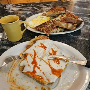 a plate of food and a cup of coffee