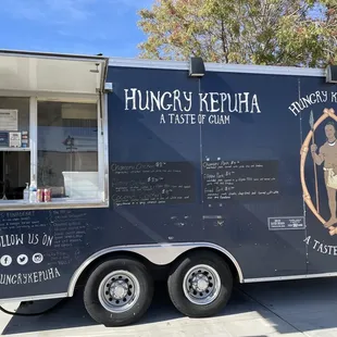 a food truck parked in a parking lot