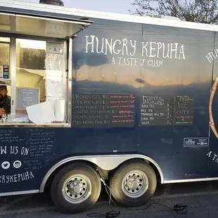 a food truck parked in a parking lot