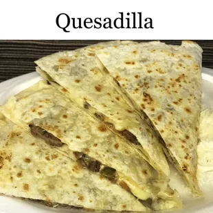 quesadilla on a paper plate