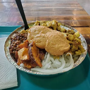 The Chicken Platter with Lentils, onions, and potatoes with Persian rice.