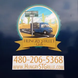 a sign for hungry street grill