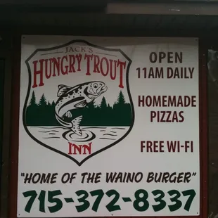 a sign for hungry trout inn