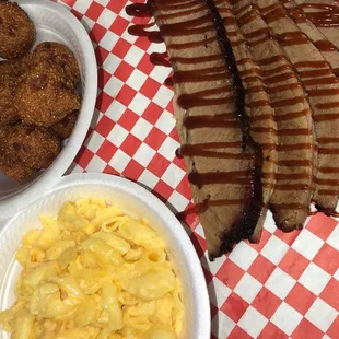 Brisket dinner Mac and cheese and hushpups