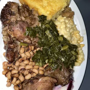 Oxtails with mac, collard greens, black eyed peas and cornbread