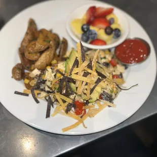 Vegan migas, potatoes and fruit