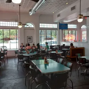 Spacious dining area with tables and booths