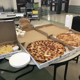 pizzas in boxes