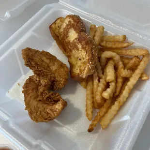 a meal in a styrofoam container
