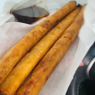 a person holding a basket of food