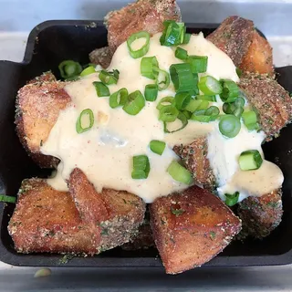 Ranch Dusted Home Fries with Sour Cream Aioli and Scallions