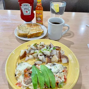 Veggie Egg White Omelette with mushrooms, tomatoes, peppers and onions. Avocado, Red Potatoes and Rye Toast! Veggie Omelette