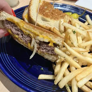 Patty melt on sourdough with grilled onions