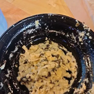 What was left of the spinach artichoke dip after we ate almost all of it.