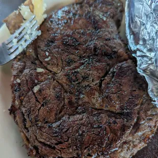 Steakhouse quality steak at a dive bar price