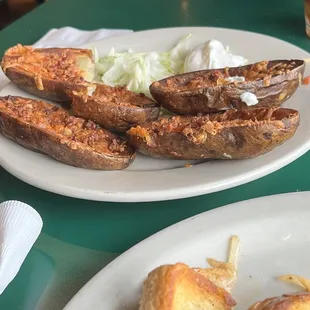 a plate of food and a glass of beer
