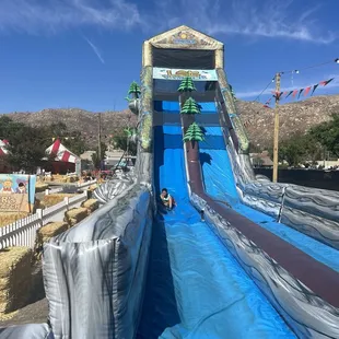 Bounce house slide the jump part is underneath the slide