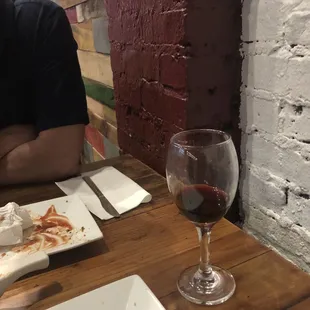 I had a burger and a glass of the house Merlot. The prices are good and the food was pretty good.