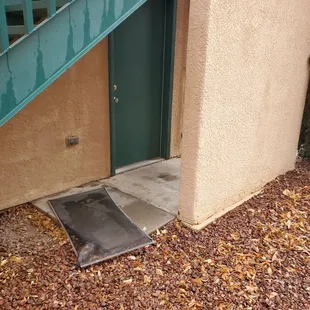 under the stairs of the club house which is no longer a clubhouse but the new office!